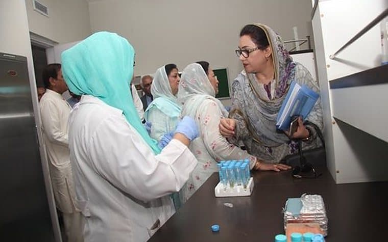 Visitors being shown laboratory work at NIGAB